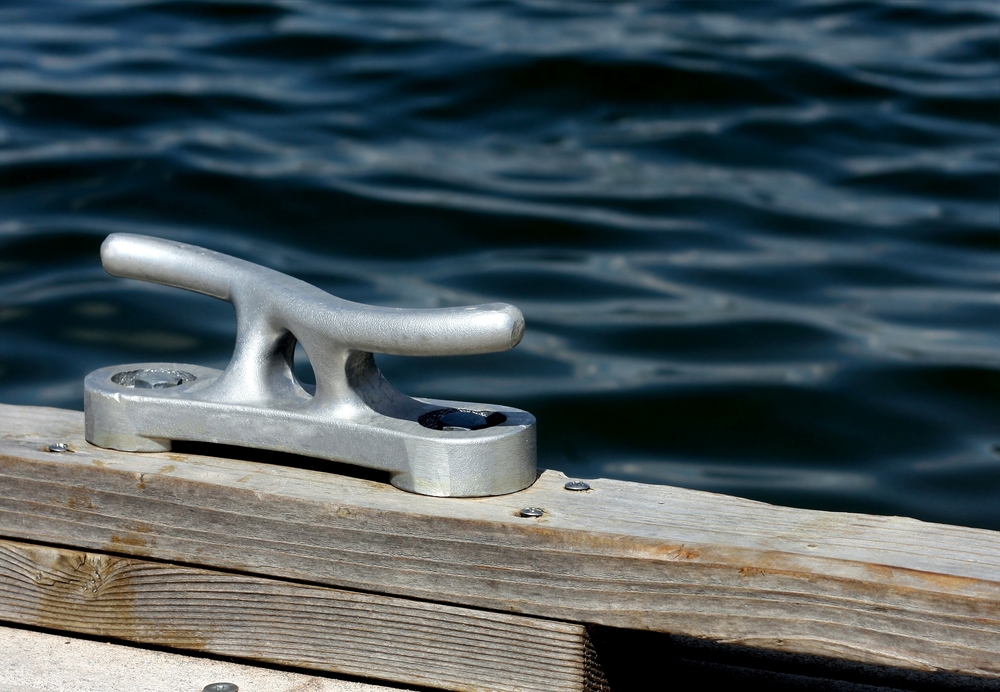 Cleat attached on a dock, fastener