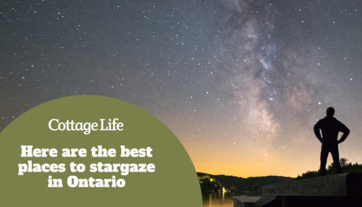 Man stargazing on a dock in Muskoka, Ontario, Canada