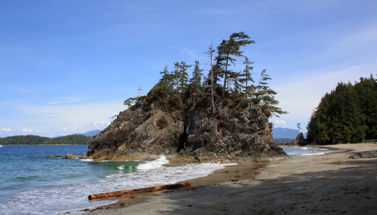 View of an ocean with a huge rock formation in Bamfield, British Columbia.