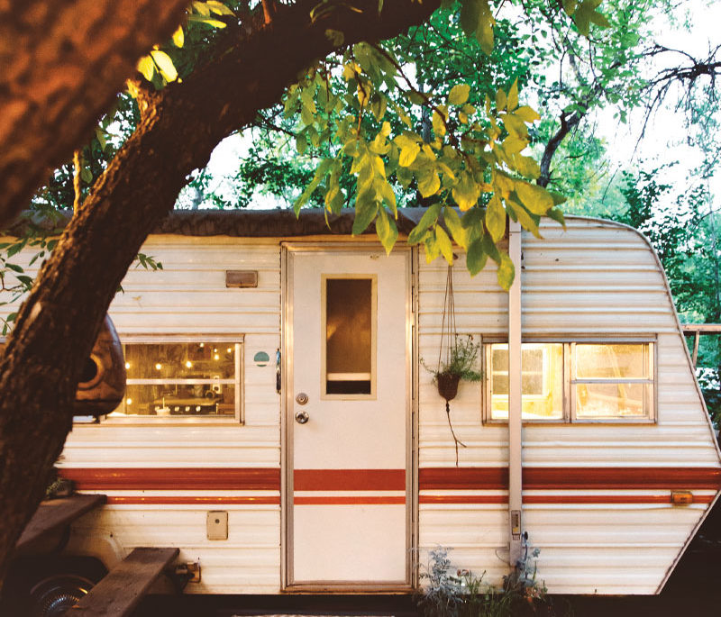 the exterior of Carey Shaw's trailer with a deck attached