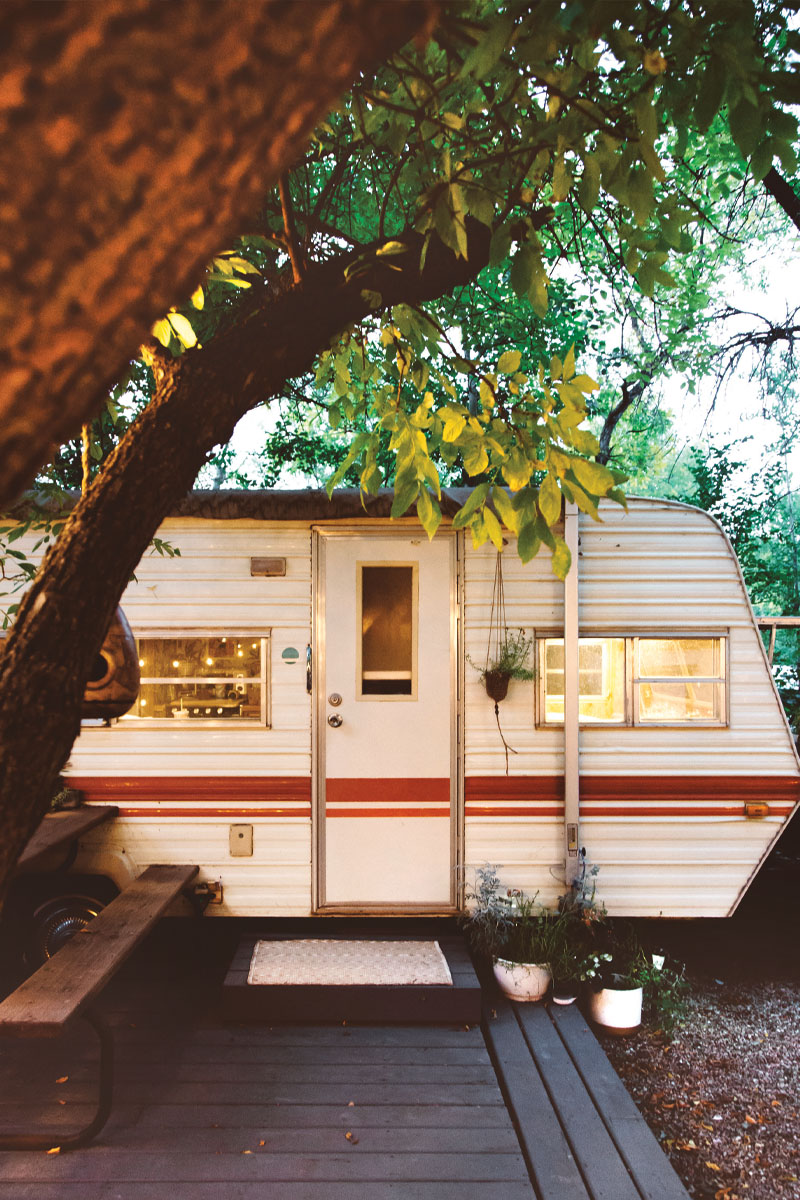 the exterior of Carey Shaw's trailer with a deck attached