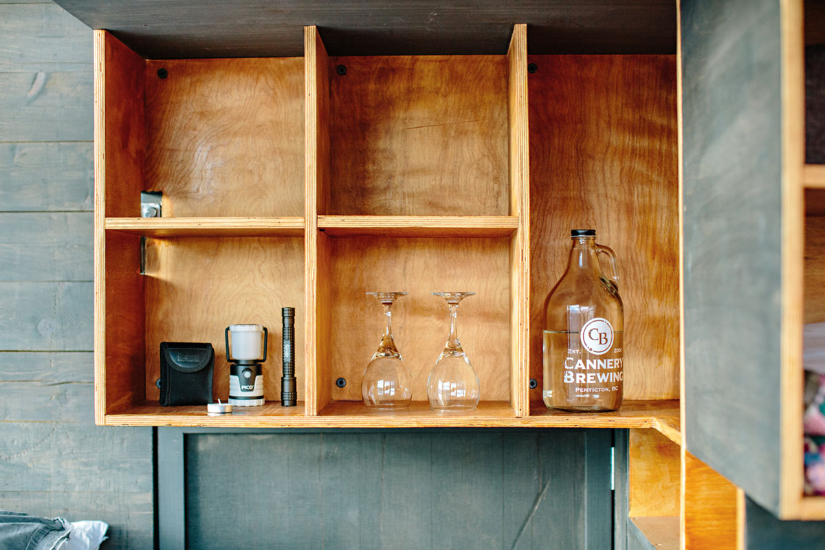 Built-in shelving in the Rumspringa tiny cabin
