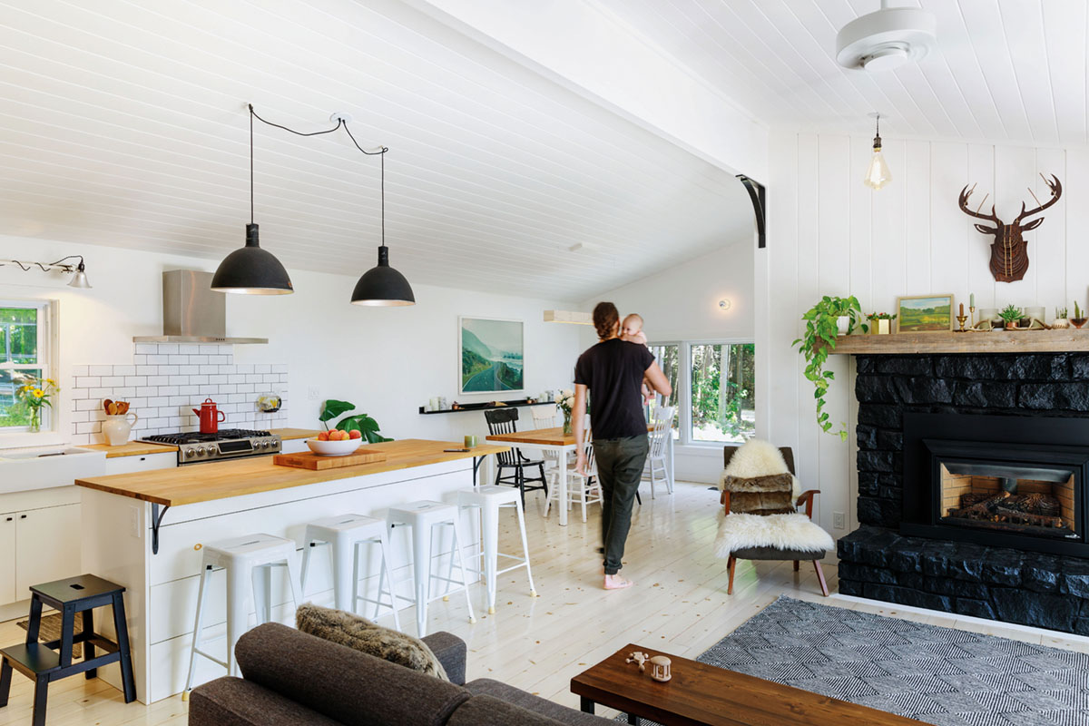 interior shot of Raina and Wilson's shared cottage kitchen and fireplace