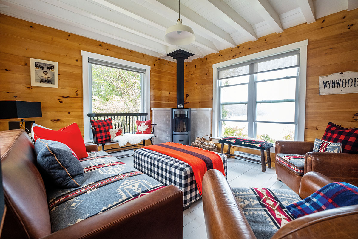 The Canada Room in Pauline and Robbie's cottage with woodstove and various Roots prints