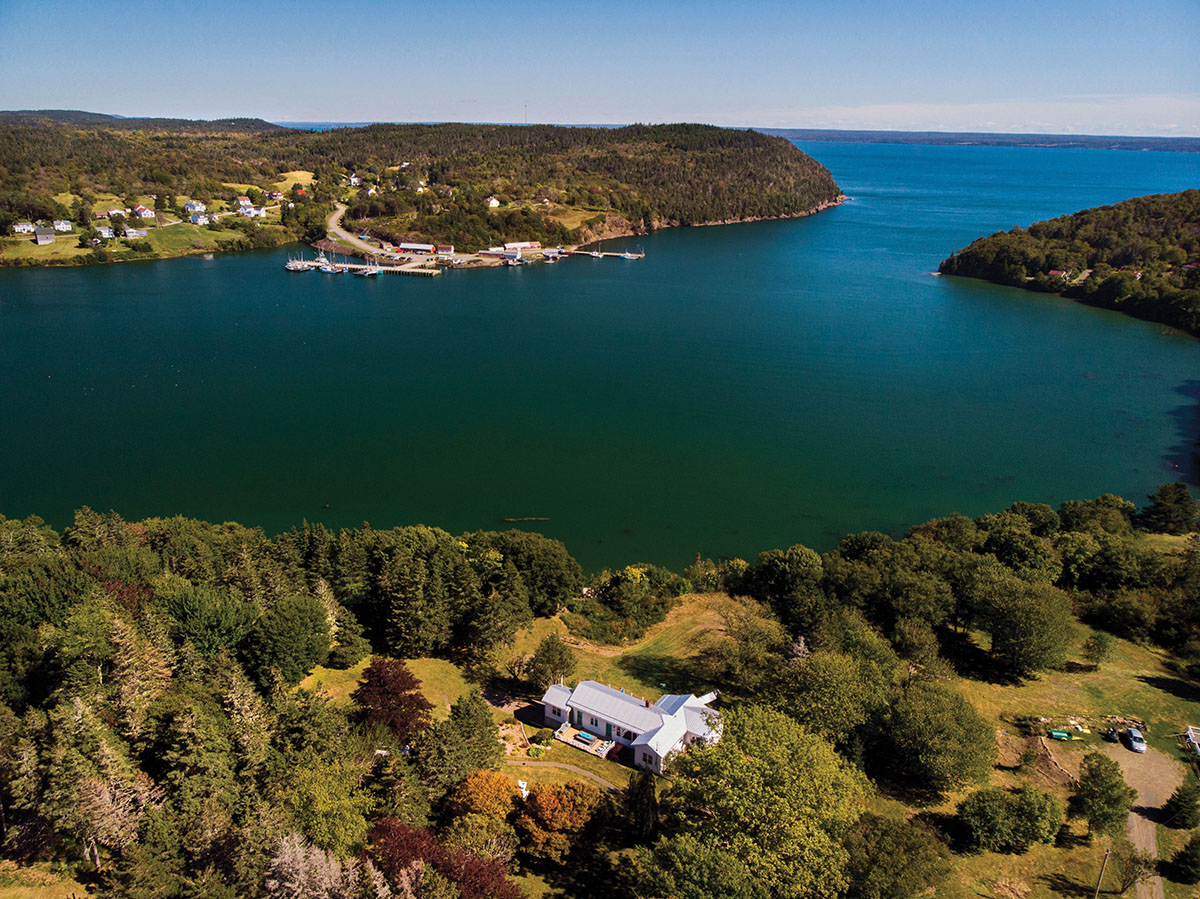 Drone shot of St. Mary's Bay and Robbie and Pauline's cottage