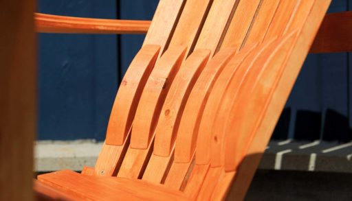 a muskoka chair modified to add lumbar support