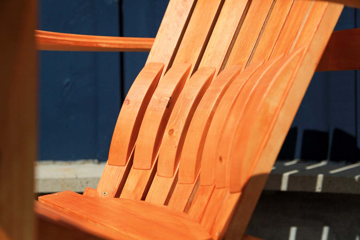 a muskoka chair modified to add lumbar support