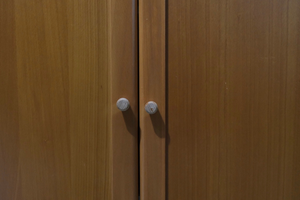 A set of uneven cabinet doors