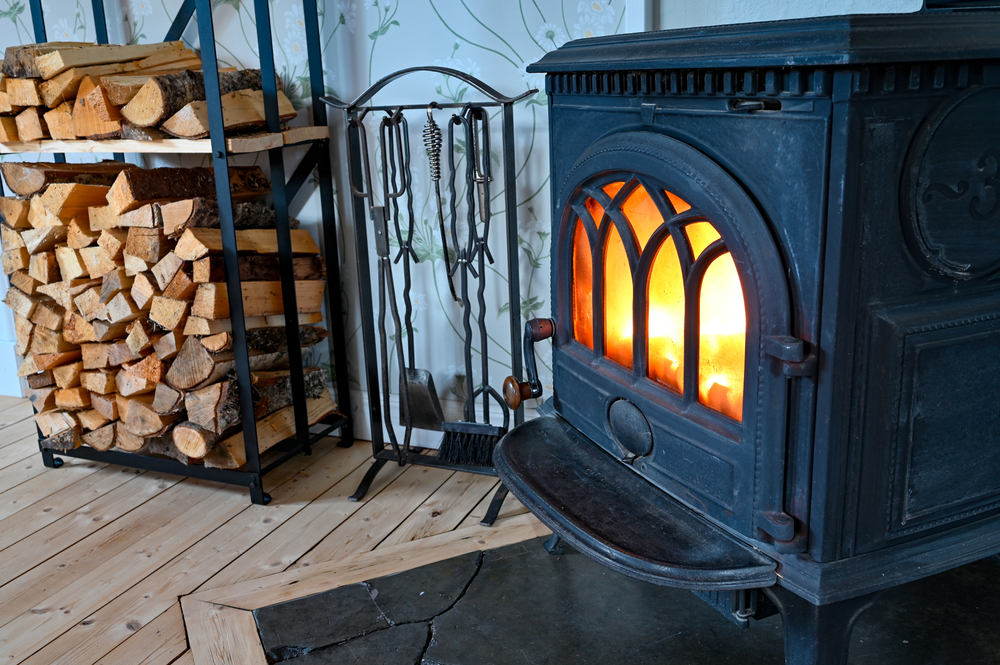 cozy wood stove with fire burning inside