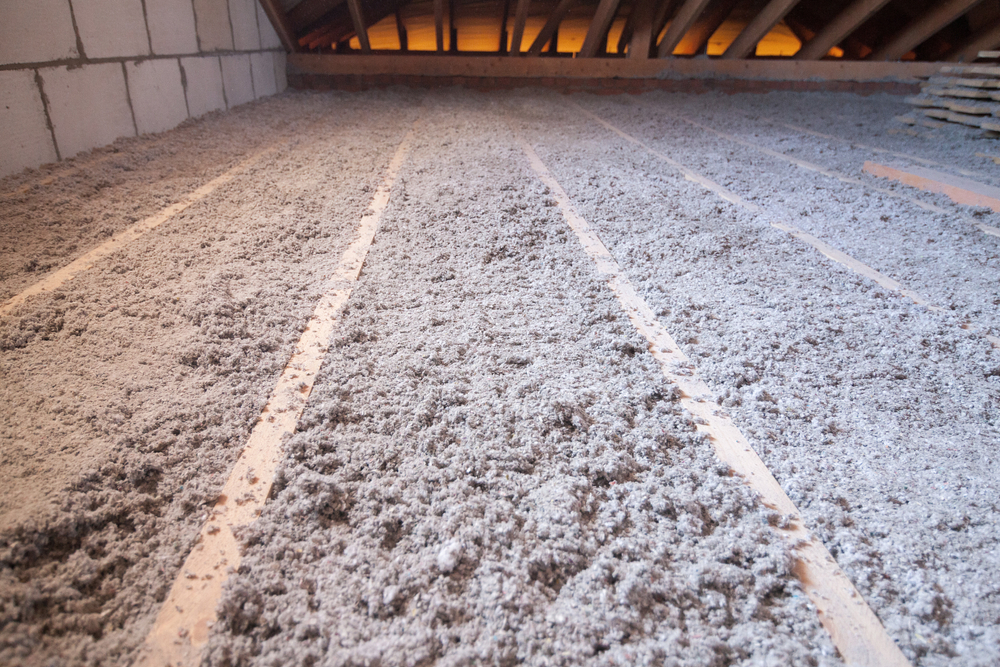 Rows of insulation in an attic