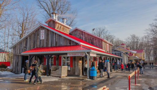 People outside a sugar shack in Quebec