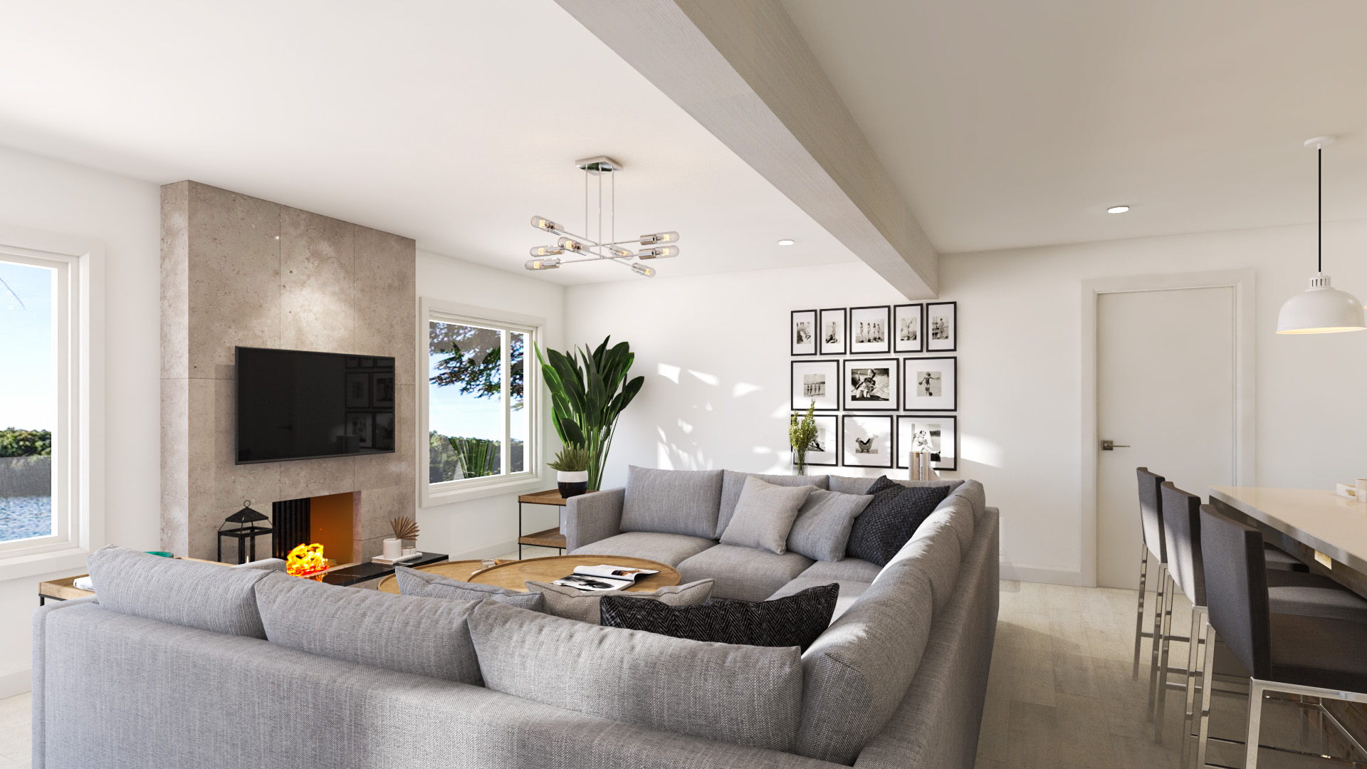 A large grey sectional couch in front of a fireplace and a large television.