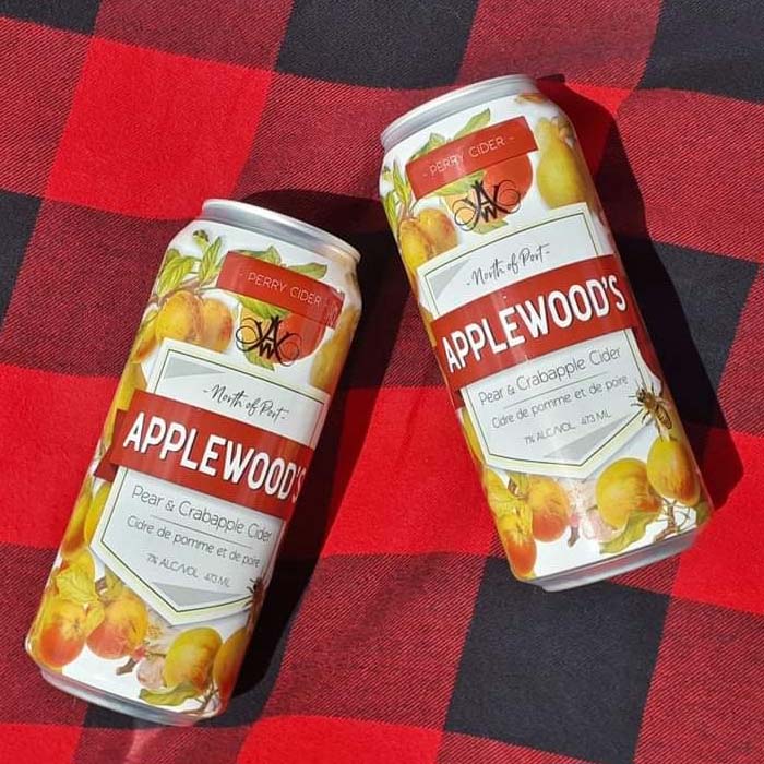 applewood farm and winery hard cider can on a plaid background