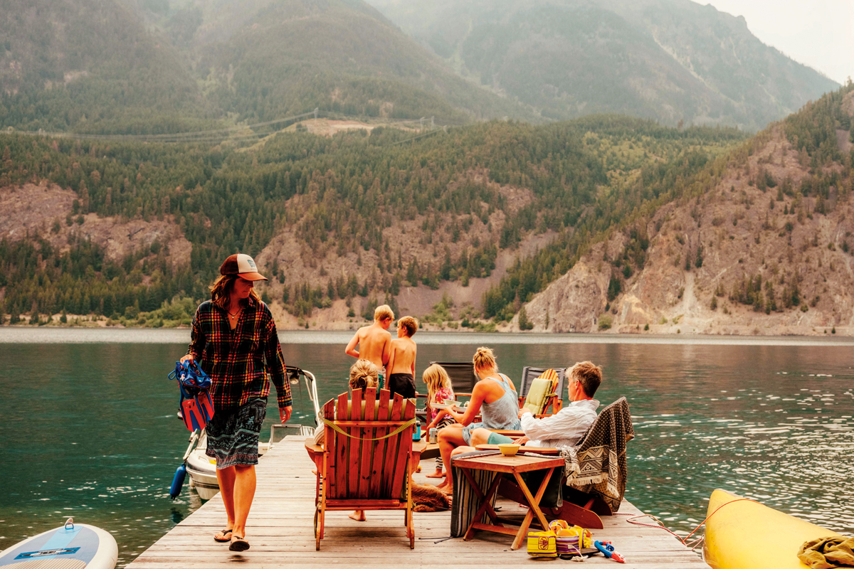 The family invites friends to stay at the cabin and they make use of the dock