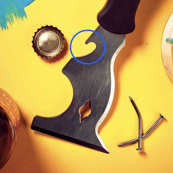 A painter's combination tool, with the beer bottle opener circled.