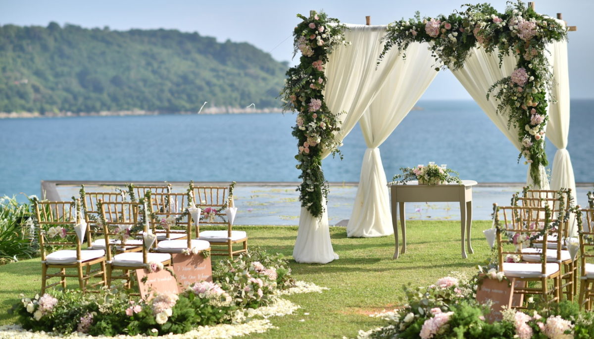 Wedding set up beside a blue lake