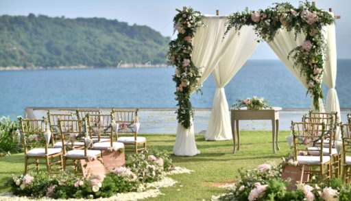 Wedding set up beside a blue lake