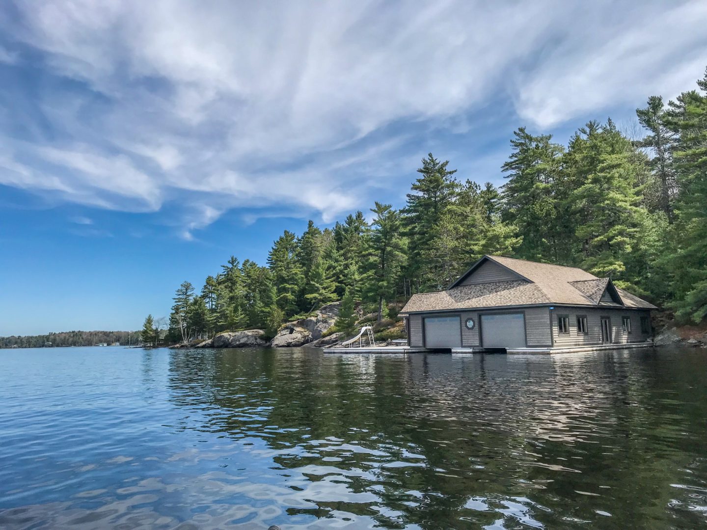 Photo contest entry of a boathouse on a Muskoka lake