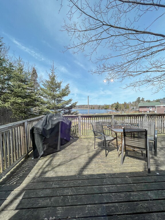 Large deck overlooking lake views.