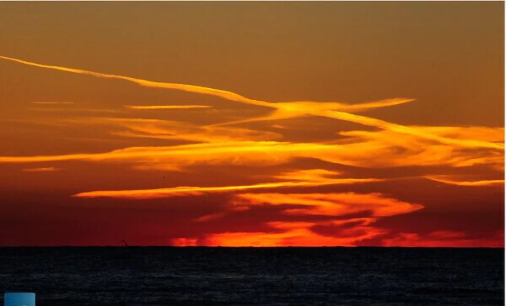Gorgeous Grand Bend sunset with yellow and orange skies.