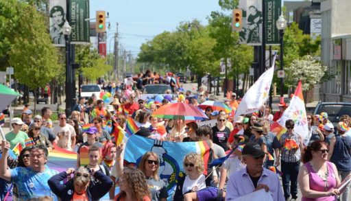 A crowd celebrates Pride Month at the Owen Sound Pride Parade.