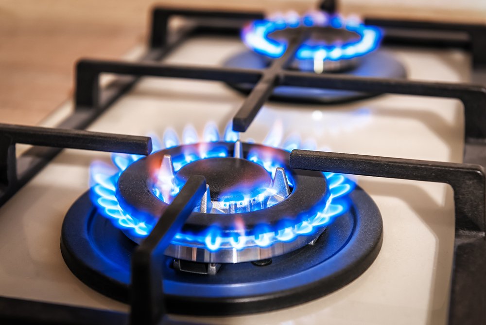 Natural gas stove burning
