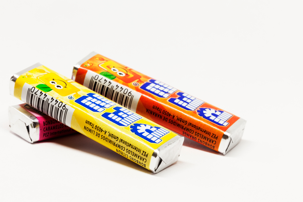 Packets of Pez candy against a white background
