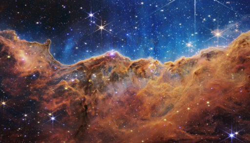 A photo of cosmic cliffs in the Carina Nebula by the James Webb Space Telescope