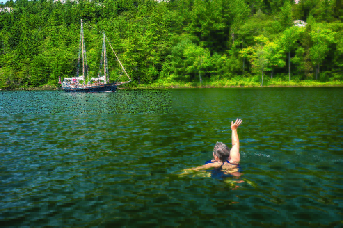 Christina swims in Baie Fine.