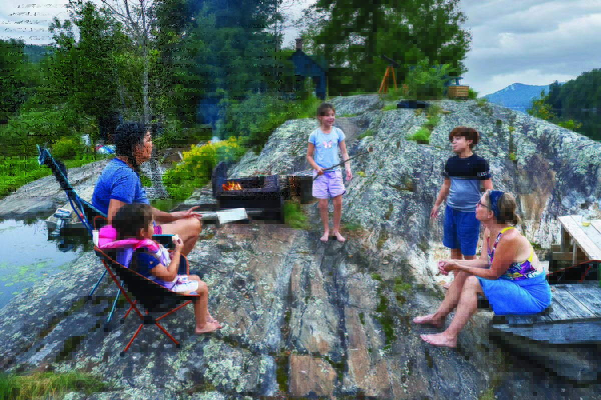 Christianna's family gathers around a fire.