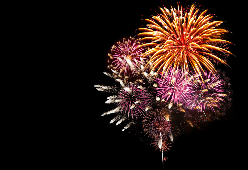 A display of fireworks against a dark night sky