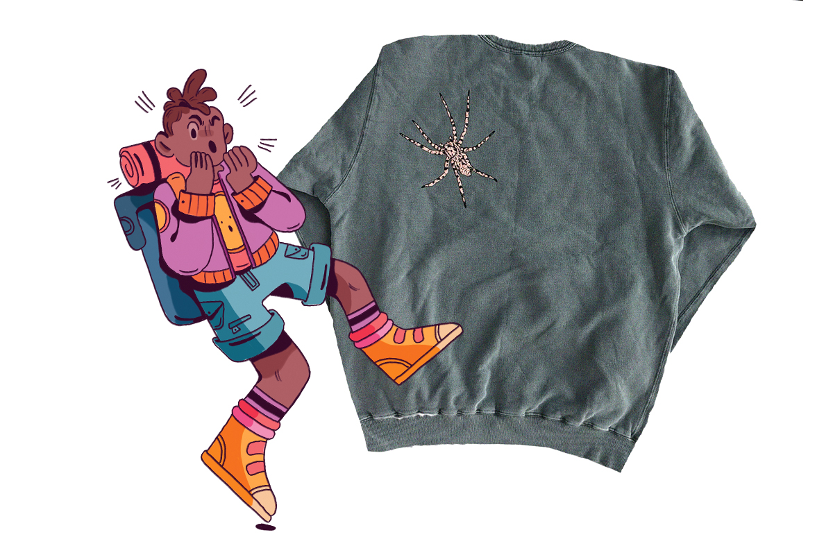 a dock spider sweatshirt with an illustrated character who is alarmed
