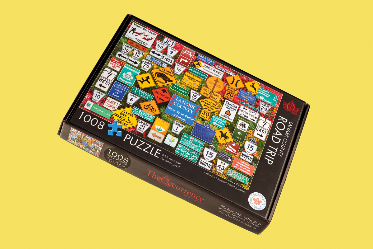 A puzzle box against a yellow background