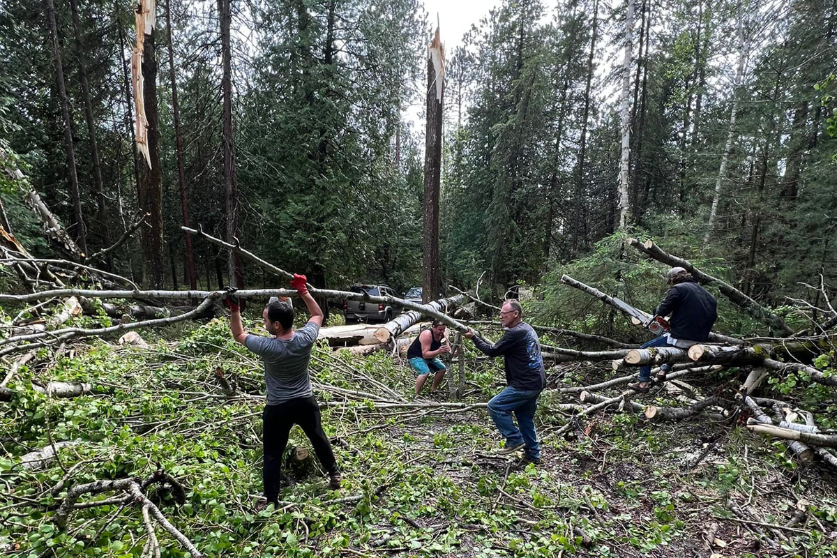 Jack Lake cottagers come together as a community and help each other with cleanup efforts from the May 21 storm.