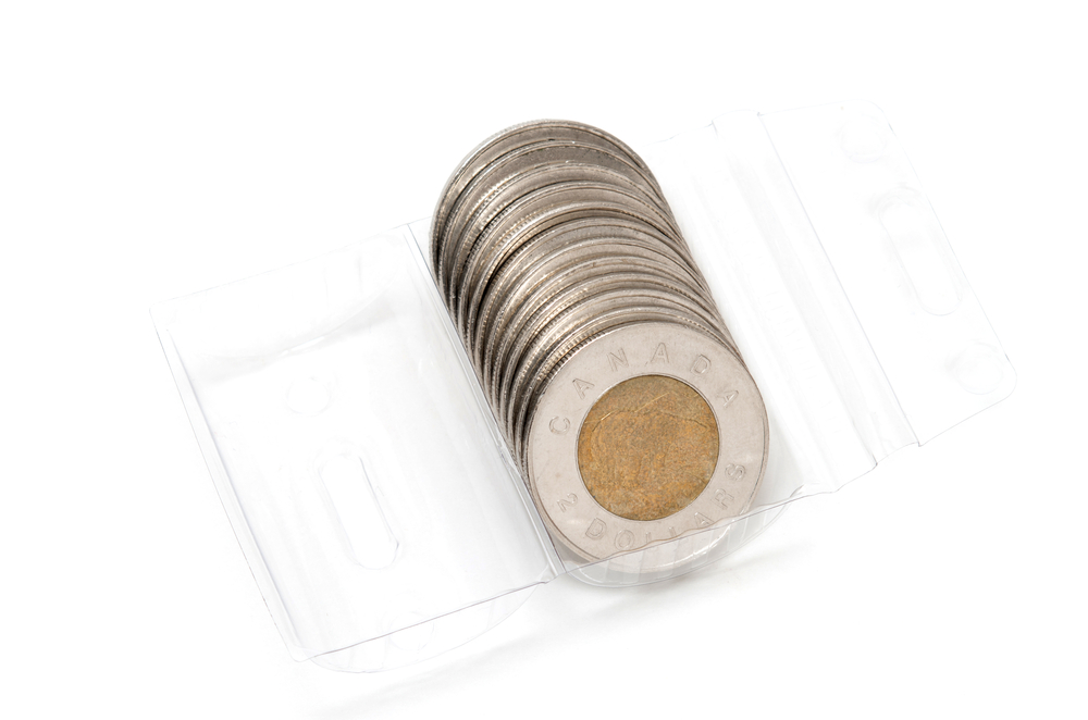 A plastic roll holding Canadian toonies