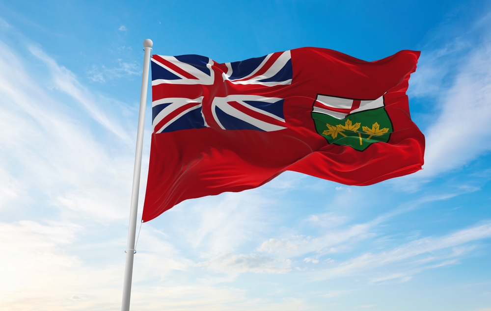 Flag of Ontario fluttering against the sky