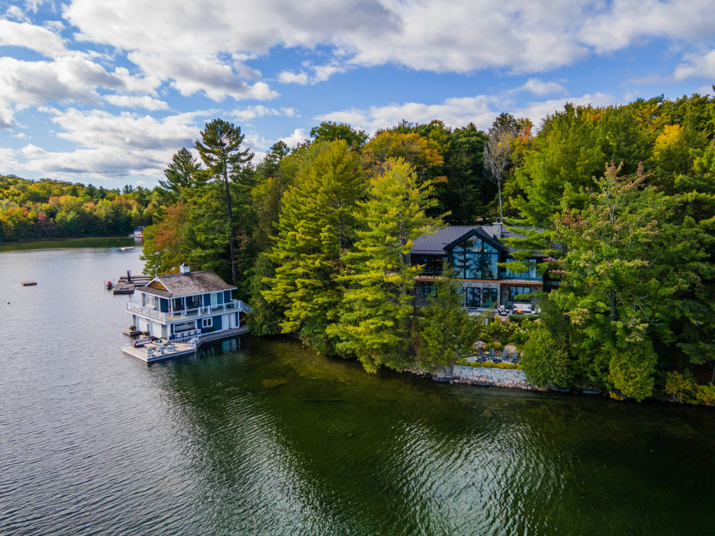 View of cottage and boathouse from the lake