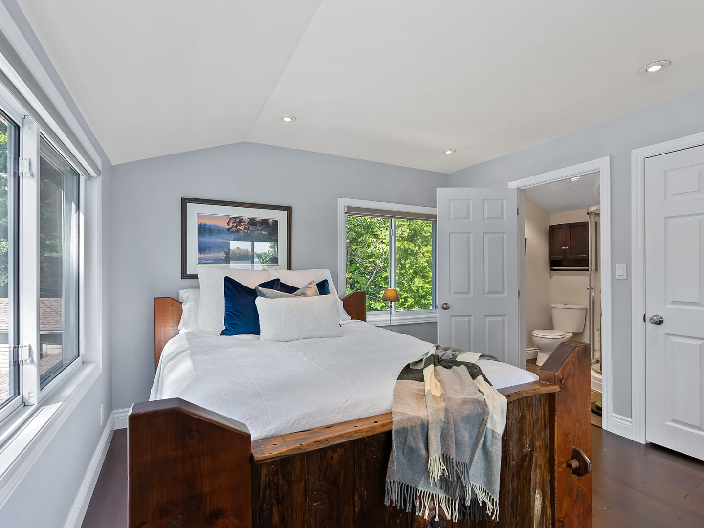 Second queen bed inside second bedroom