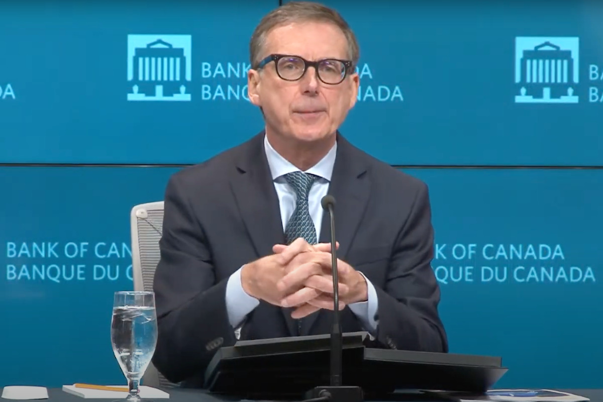 Tiff Macklem delivers news about the Bank of Canada raising interest rates in a press conference on October 26, 2022