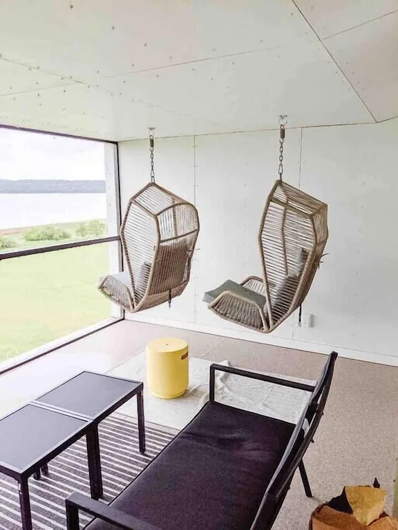 hanging basket chairs overlook window