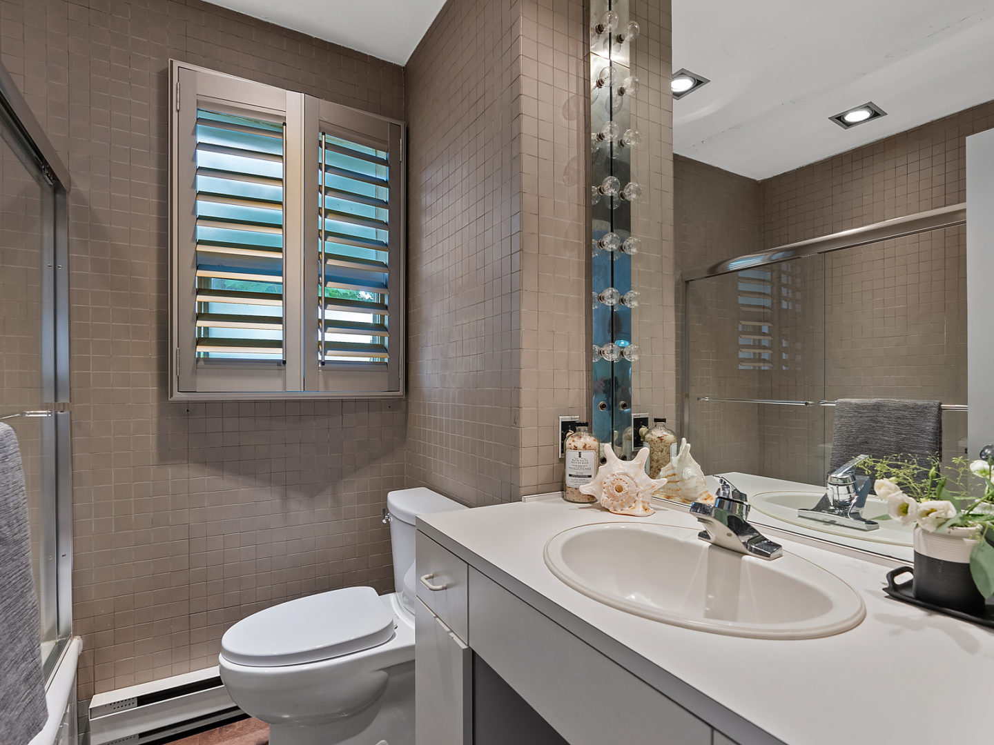 A small bathroom with a toilet and a sink.