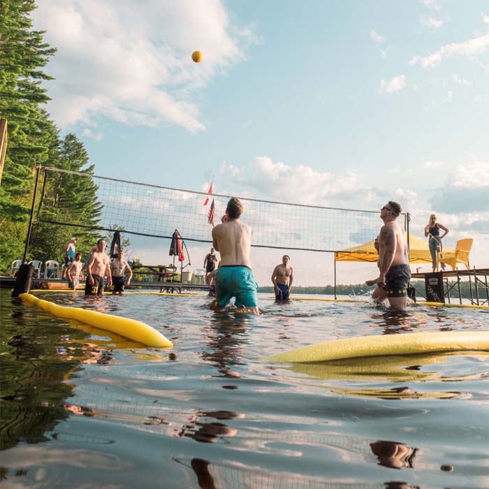 The men playing volleyball