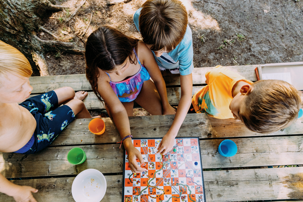 Overhead shot of a group of kids at a picnic table