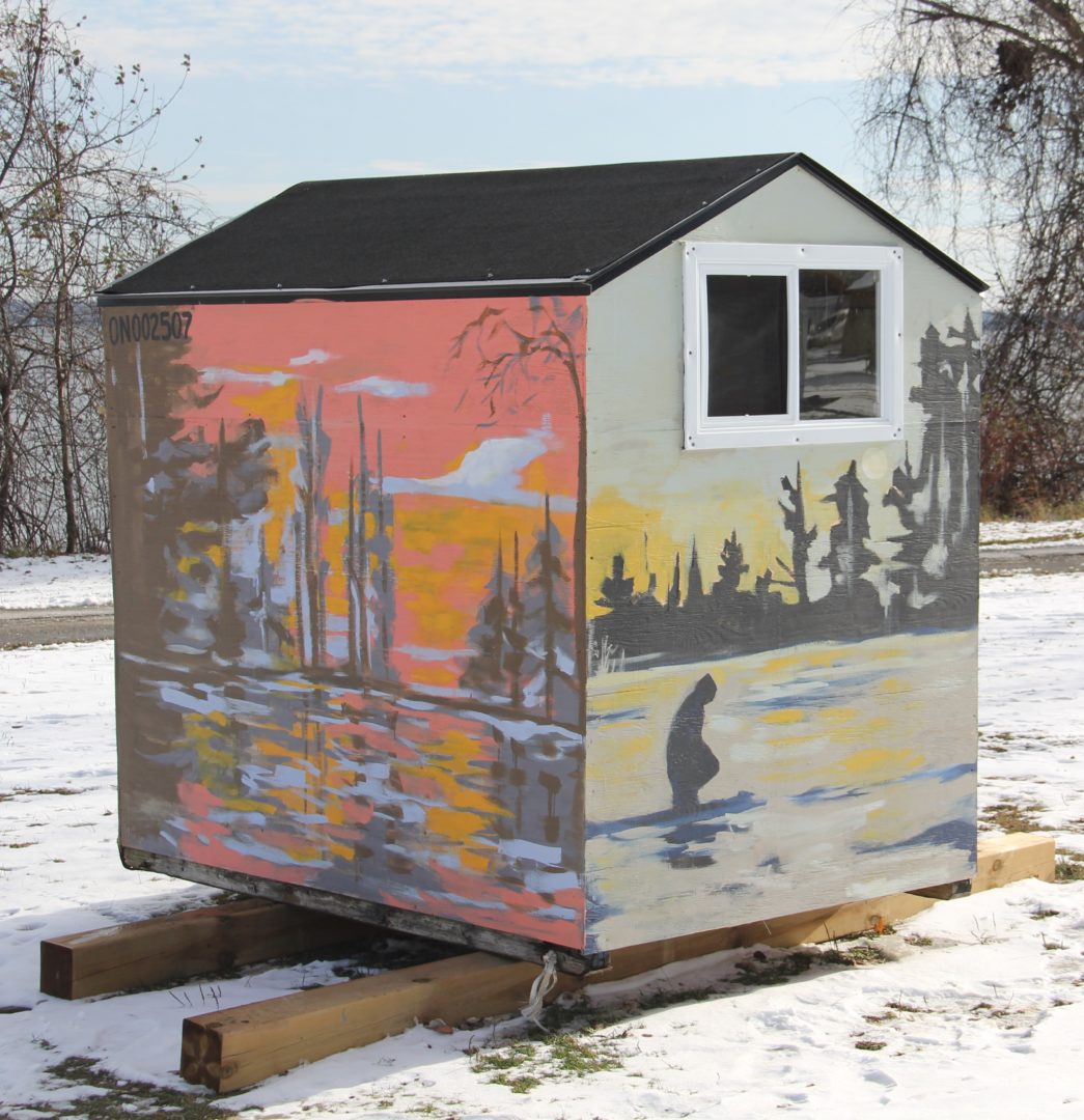 A painted ice fishing hut