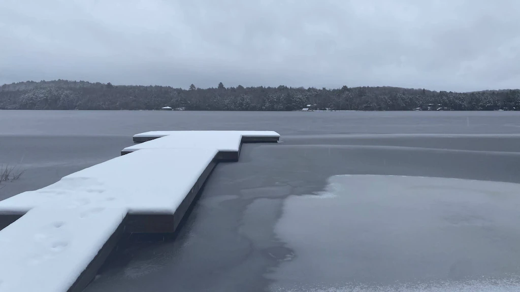 Dock in frozen lake