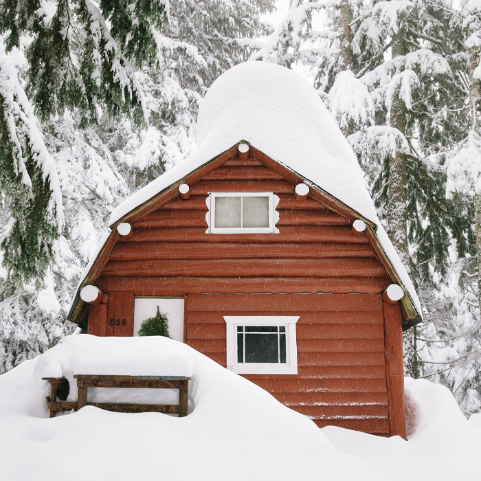 A snow-covered cabin