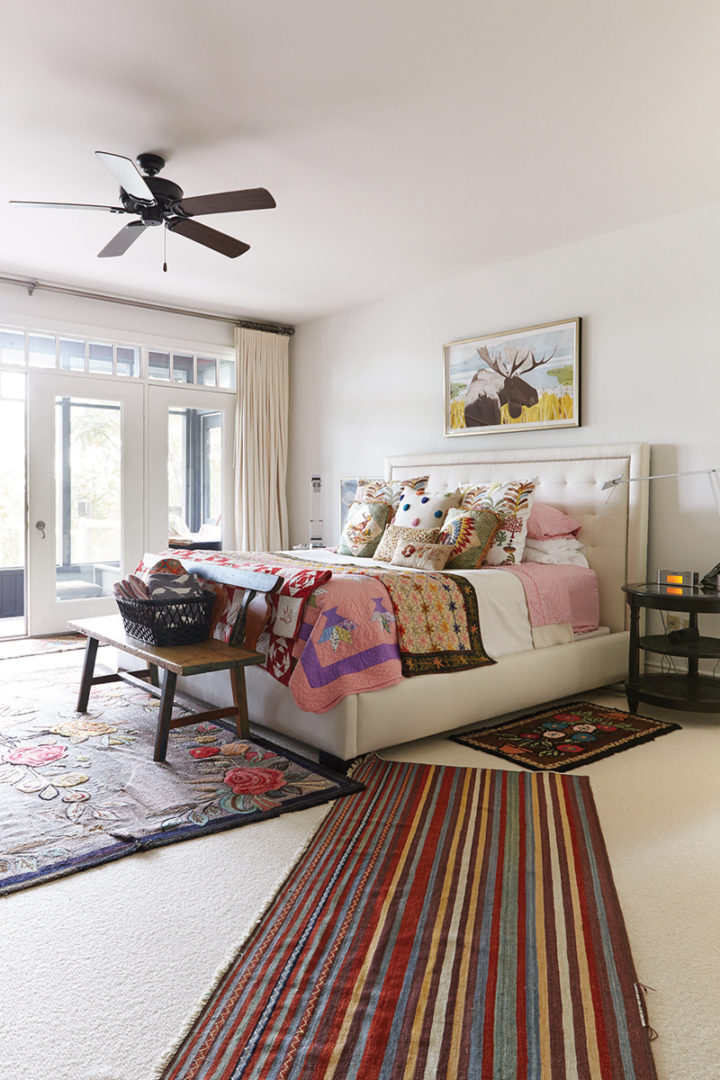 bedroom with quilts on the bed