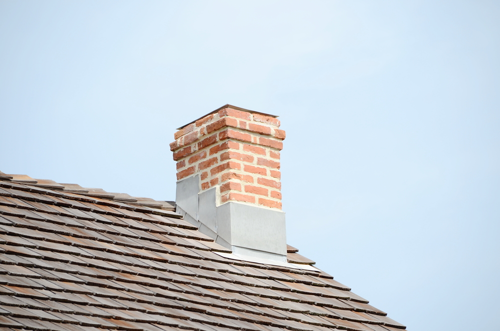A close-up of a chimney on a roof