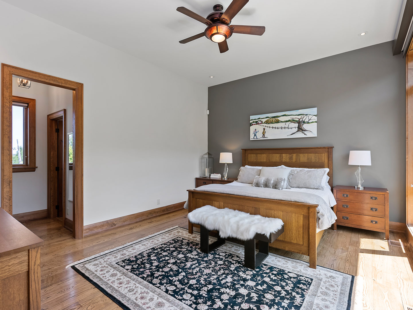 A large primary bedroom with a big bed.