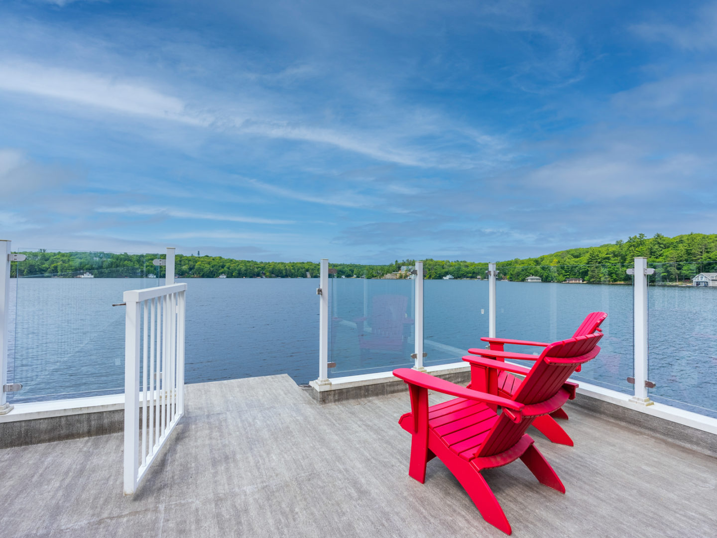 Rooftop deck on a boathouse, looking over the lake.